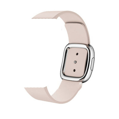 Leather modern buckle strap for Apple Watch in pink color, showcasing its sleek design and genuine leather material.